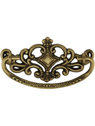 Victorian-Style Crown Brass Bail Pull ‚Äì 3‚Äù Center-to-Center in Antique Brass.